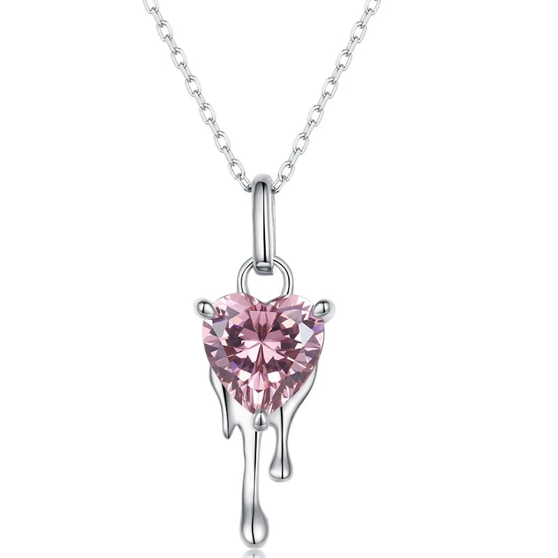 A 925 sterling silver pendant necklace with a pink crystal zircon in a melting heart shape design, displayed on a white background.
