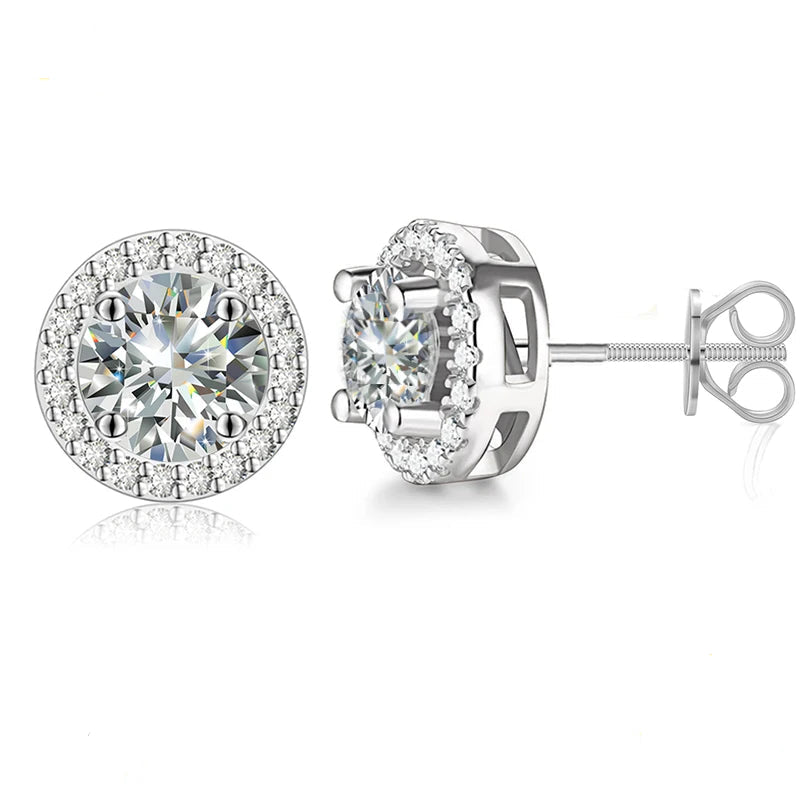 A pair of 926 Sterling Silver VVS1 Moissanite Stud Earrings with a round cut gemstone in the center, surrounded by smaller stones on the halo, set against a white background.